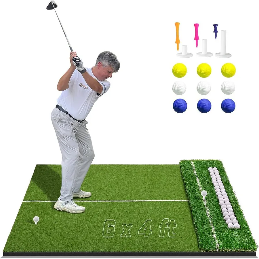 Oversized dual-turf golf hitting mat with built-in ball tray for a garage simulator
