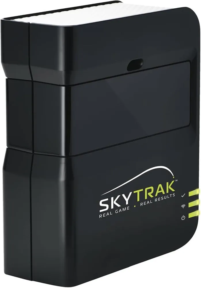 SkyTrak photometric golf launch monitor on an indoor hitting mat